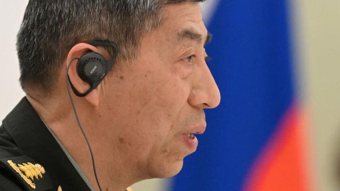 Chinese Defence Minister Li Shangfu attends a meeting with Russian President Vladimir Putin and Defence Minister Sergei Shoigu in Moscow, Russia, April 16, 2023. Sputnik/Pavel Bednyakov/Pool via REUTERS/File photo Acquire Licensing Rights