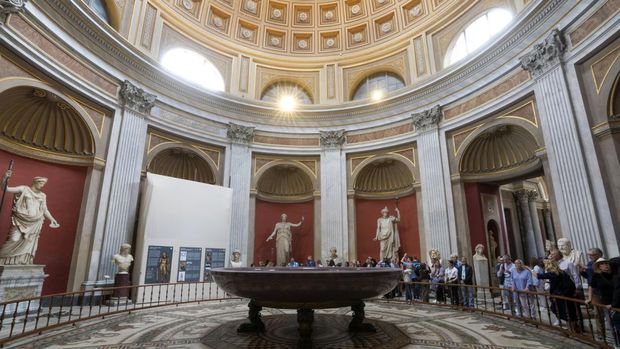 A view of the the Round Hall of the Vatican Museums, where restorers work behind scaffolding on the bronze Hercules statue, Thursday, May 11, 2023. Work will continue until December to reveal the 4-meter- (13-foot-) tall Hercules, believed to have stood in ancient Rome’s Pompey Theater, to its original golden sheen. The discovery of the gilded bronze in 1864 during work on a banker’s villa near Piazza dei Fiori made global headlines. (AP Photo/Andrew Medichini)