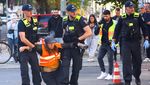 Aktivis di Jerman Lem Tangan ke Aspal, Protes Krisis Iklim
