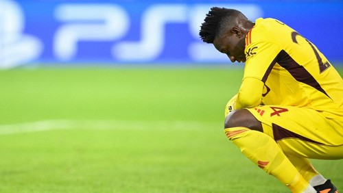Manchester Uniteds Cameroonian goalkeeper #24 Andre Onana reacts after conceding the opening goal during the UEFA Champions League Group A football match FC Bayern Munich v Manchester United in Munich, southern Germany on September 20, 2023. (Photo by Tobias SCHWARZ / AFP)