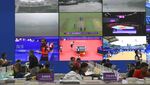 Potret Kesibukan Jurnalis di Media Center Asian Games Hangzhou