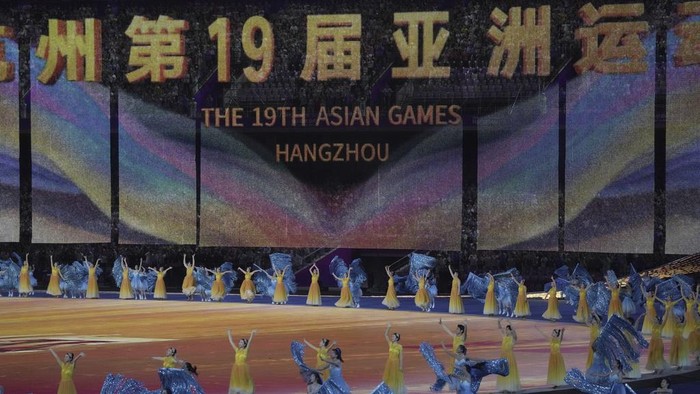 Artists perform during the opening ceremony of the 19th Asian Games in Hangzhou, China, Saturday, Sept. 23, 2023. (AP Photo/Dita Alangkara)