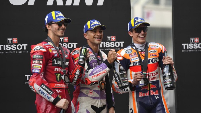 From left, Sprint race winners, Second place Ducati Lenovo Team Italian rider Francesco Bagnaia, first place Prima Pramac Racing (Ducati) team Spanish rider Jorge Martín and third place Repsol Honda Team Spanish rider Marc Marquez celebrate during Moto GP Bharat in Greater Noida, on the outskirts of New Delhi, India Saturday, Sept. 23, 2023. (AP Photo/Manish Swarup)