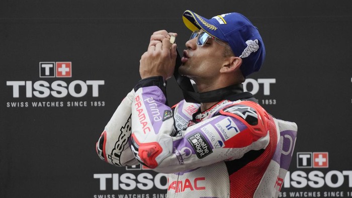 Prima Pramac Racing (Ducati) team Spanish rider Jorge Martín celebrates after wining Sprint race during Moto GP Bharat in Greater Noida, on the outskirts of New Delhi, India Saturday, Sept. 23, 2023. (AP Photo/Manish Swarup)