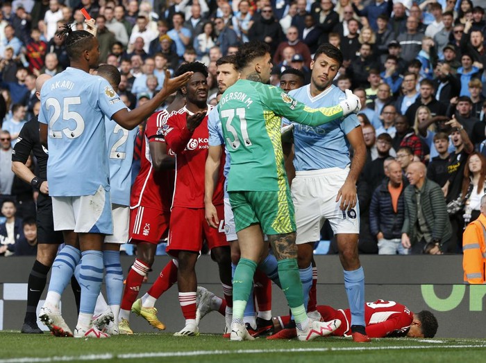 Soccer Football - Premier League - Manchester City v Nottingham Forest - Etihad Stadium, Manchester, Britain - September 23, 2023 Manchester Citys Rodri reacts after being shown a red card by referee Anthony Taylor Action Images via Reuters/Ed Sykes NO USE WITH UNAUTHORIZED AUDIO, VIDEO, DATA, FIXTURE LISTS, CLUB/LEAGUE LOGOS OR LIVE SERVICES. ONLINE IN-MATCH USE LIMITED TO 45 IMAGES, NO VIDEO EMULATION. NO USE IN BETTING, GAMES OR SINGLE CLUB/LEAGUE/PLAYER PUBLICATIONS.
