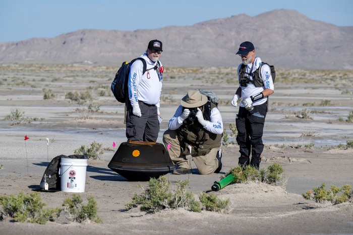The return capsule containing a sample collected from the asteroid Bennu in October 2020 by NASA’s OSIRIS-REx spacecraft is seen shortly after touching down in the desert at the Department of Defenses Utah Test and Training Range in Dugway, Utah, U.S. September 24, 2023.  NASA/Keegan Barber/Handout via REUTERS THIS IMAGE HAS BEEN SUPPLIED BY A THIRD PARTY. MANDATORY CREDIT     TPX IMAGES OF THE DAY