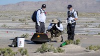 The return capsule containing a sample collected from the asteroid Bennu in October 2020 by NASA’s OSIRIS-REx spacecraft is seen shortly after touching down in the desert at the Department of Defenses Utah Test and Training Range in Dugway, Utah, U.S. September 24, 2023.  NASA/Keegan Barber/Handout via REUTERS THIS IMAGE HAS BEEN SUPPLIED BY A THIRD PARTY. MANDATORY CREDIT     TPX IMAGES OF THE DAY