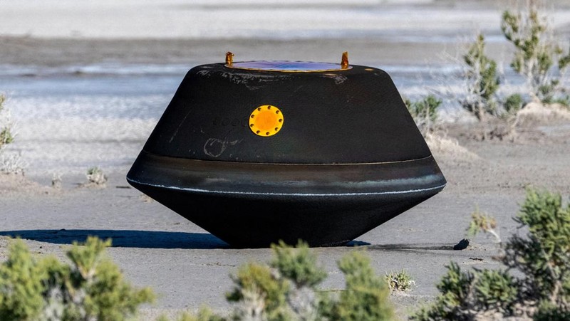 The return capsule containing a sample collected from the asteroid Bennu in October 2020 by NASA’s OSIRIS-REx spacecraft is seen shortly after touching down in the desert at the Department of Defense's Utah Test and Training Range in Dugway, Utah, U.S. September 24, 2023.  NASA/Keegan Barber/Handout via REUTERS THIS IMAGE HAS BEEN SUPPLIED BY A THIRD PARTY. MANDATORY CREDIT     TPX IMAGES OF THE DAY
