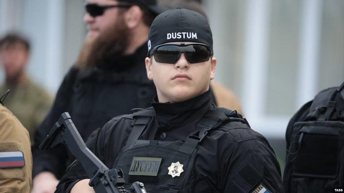 Adam Kadyrov is seen at a parade marking the 70th birthday of Russian President Vladimir Putin in Grozny in October 2022. (TASS)