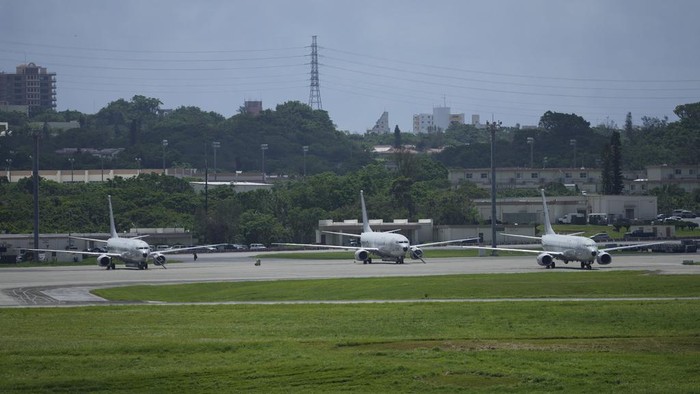 A U.S. MV-22B Osprey transport aircraft, left, taxies before taking off from the U.S. Marine Corps Air Station Futenma in Ginowan, south of Okinawa, southern Japan, Wednesday, Sept. 6, 2023. (AP Photo/Hiro Komae)
