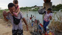 Para migran ini berasal dari negara-negara konflik. Mereka berjalan ke AS untuk mencari perlindungan.    