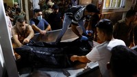 Sebanyak 100 orang tewas dan 150 lainnya luka-luka dalam insiden kebakaran di sebuah pesta pernikahan di Irak. (REUTERS/Khalid Al-Mousily)  