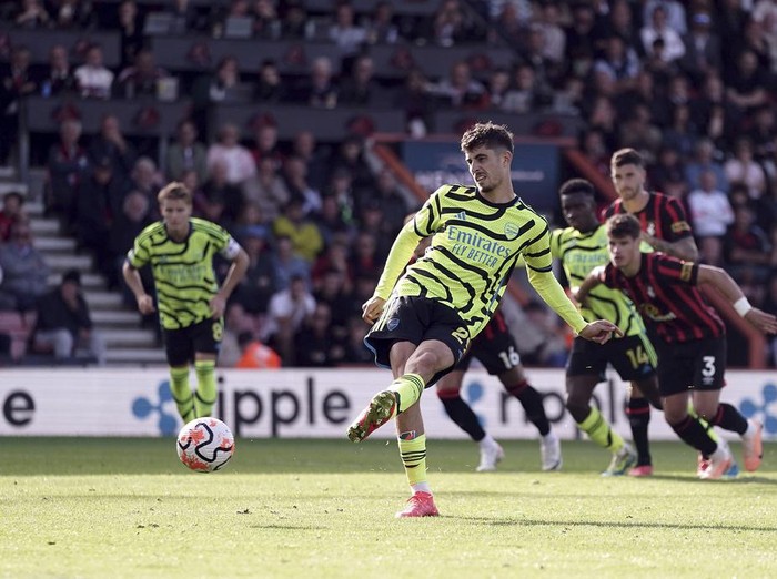 Arsenal's Kai Havertz scores his side's third goal of the game during their English Premier League soccer match against Bournemouth at the Vitality Stadium, Bournemouth, England, Saturday, Sept. 30, 2023. (Robbie Stephenson/PA via AP)