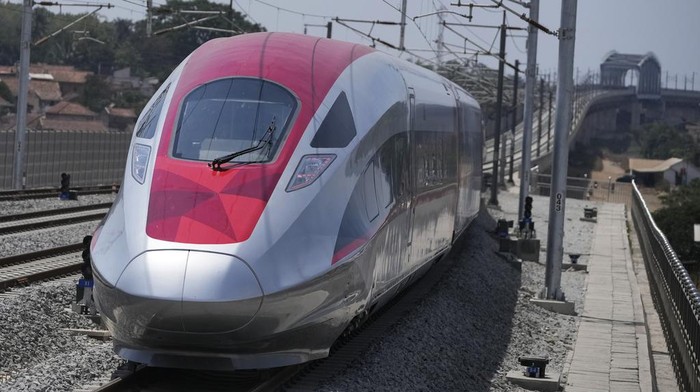 High-speed train is parked during the opening ceremony for launching Southeast Asias first high-speed railway at Halim station in Jakarta, Indonesia, Monday, Oct. 2, 2023. Indonesian President Joko Widodo launched Southeast Asias first high-speed railway that will start its commercial operations on Monday, a key project under Chinas Belt and Road infrastructure initiative that will cut travel time between two cities from the current three hours to about 40 minutes. (AP Photo/Achmad Ibrahim)