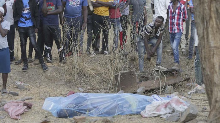 The body of a trapped miner is carried after been retrieved from a collapsed mine shaft in Chegutu, about 100 kilometers (60 miles) west of the capital Harare, Saturday, Sept. 30 2023. Several people have died from the collapse of a gold mine in Zimbabwe, according to  state media reports. (AP Photo)
