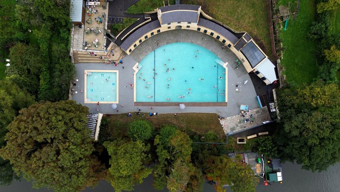 People swim at Cleveland Pools during the first day of reopening to the public in Bath, Britain, September 10, 2023. REUTERS/Carl Recine