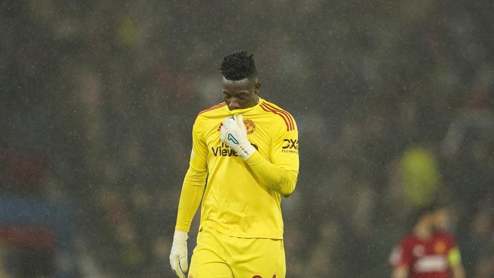Manchester Uniteds goalkeeper Andre Onana reacts during the Champions League group A soccer match between Manchester United and Galatasaray at the Old Trafford stadium in Manchester, England, Tuesday, Oct. 3, 2023. (AP Photo/Dave Thompson)