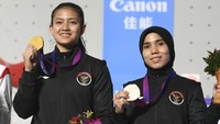 Selain Desak Made Rita Kusuma Dewi (kiri) yang memangkan emas, Rajiah Sallsabillah (kanan) juga meraih perunggu dengan mencatatkan waktu 6.879 detik.  