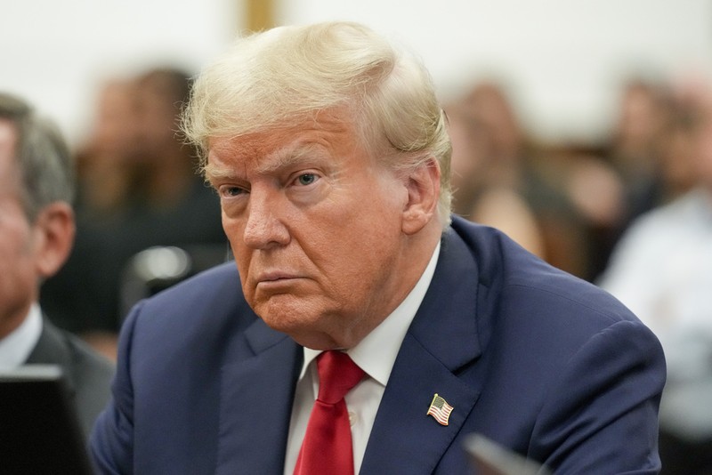 Former President Donald Trump sits in the courtroom before the continuation of his civil business fraud trial at New York Supreme Court, Tuesday, Oct. 3, 2023, in New York. (AP Photo/Seth Wenig, POOL)