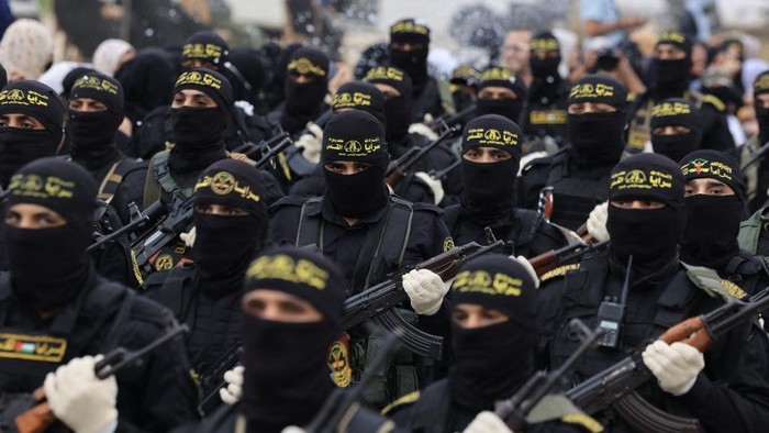 Palestinian militants of the Islamic Jihad movement participate in an anti-Israel military parade marking the 36th anniversary of the movements foundation in Gaza City, October 4, 2023. (Photo by MAHMUD HAMS / AFP)