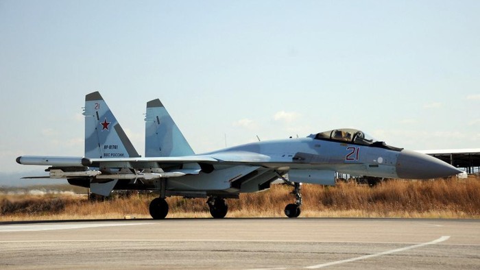 A Russian air force Sukhoi Su-35 fighter lands at the Russian military base of Hmeimim, located south-east of the city of Latakia in Hmeimim, Latakia Governorate, Syria, on September 26, 2019. With military backing from Russia, President Bashar al-Assads forces have retaken large parts of Syria from rebels and jihadists since 2015, and now control around 60 percent of the country. Russia often refers to troops it deployed in Syria as military advisers even though its forces and warplanes are also directly involved in battles against jihadists and other rebels (Photo by Maxime POPOV / AFP)