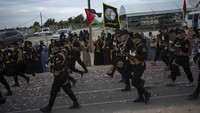 Gerakan Jihad Islam Palestina mengadakan parade militer anti-Israel untuk menandai peringatan 36 tahun berdirinya gerakan tersebut.  