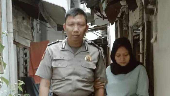 Aipda Rully dan istrinya, Linda