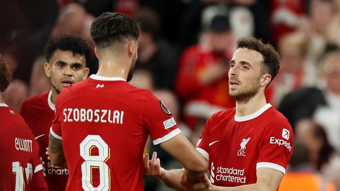 Soccer Football - Europa League - Group E - Liverpool v Union Saint-Gilloise - Anfield, Liverpool, Britain - October 5, 2023 Liverpools Diogo Jota celebrates scoring their second goal with Dominik Szoboszlai REUTERS/Phil Noble