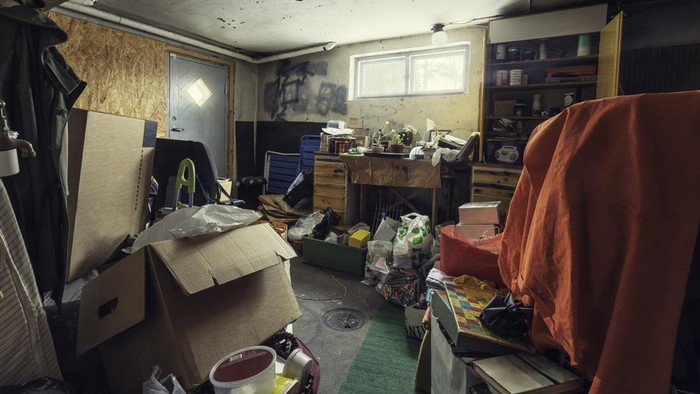 A messy basement / storage room with lots of things.