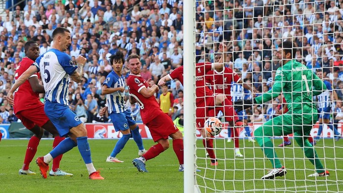 Soccer Football - Premier League - Brighton & Hove Albion v Liverpool - The American Express Community Stadium, Brighton, Britain - October 8, 2023 Brighton & Hove Albions Lewis Dunk scores their second goal REUTERS/Toby Melville NO USE WITH UNAUTHORIZED AUDIO, VIDEO, DATA, FIXTURE LISTS, CLUB/LEAGUE LOGOS OR LIVE SERVICES. ONLINE IN-MATCH USE LIMITED TO 45 IMAGES, NO VIDEO EMULATION. NO USE IN BETTING, GAMES OR SINGLE CLUB/LEAGUE/PLAYER PUBLICATIONS.