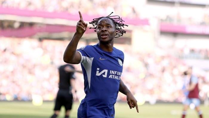 Chelseas Raheem Sterling celebrates scoring his sides third goal of the game, during the English Premier League soccer match between Burnley and Chelsea,  at Turf Moor, in Burnley, England, Saturday, Oct. 7, 2023. (Richard Sellers/PA via AP)
