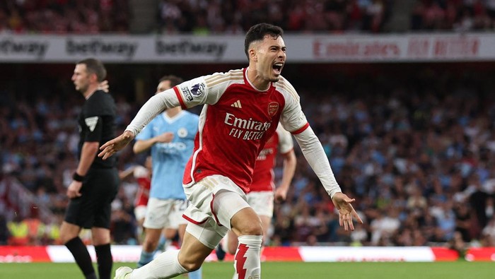 Soccer Football - Premier League - Arsenal v Manchester City - Emirates Stadium, London, Britain - October 8, 2023 Arsenals Gabriel Martinelli celebrates scoring their first goal REUTERS/David Klein NO USE WITH UNAUTHORIZED AUDIO, VIDEO, DATA, FIXTURE LISTS, CLUB/LEAGUE LOGOS OR LIVE SERVICES. ONLINE IN-MATCH USE LIMITED TO 45 IMAGES, NO VIDEO EMULATION. NO USE IN BETTING, GAMES OR SINGLE CLUB/LEAGUE/PLAYER PUBLICATIONS.