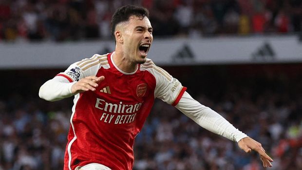 Soccer Football - Premier League - Arsenal v Manchester City - Emirates Stadium, London, Britain - October 8, 2023 Arsenal's Gabriel Martinelli celebrates scoring their first goal REUTERS/David Klein NO USE WITH UNAUTHORIZED AUDIO, VIDEO, DATA, FIXTURE LISTS, CLUB/LEAGUE LOGOS OR 'LIVE' SERVICES. ONLINE IN-MATCH USE LIMITED TO 45 IMAGES, NO VIDEO EMULATION. NO USE IN BETTING, GAMES OR SINGLE CLUB/LEAGUE/PLAYER PUBLICATIONS.