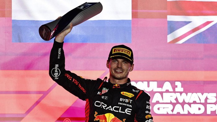 Formula One F1 - Qatar Grand Prix - Lusail International Circuit, Lusail, Qatar - October 8, 2023 First placed Max Verstappen of Red Bull celebrates with his trophy on the podium after the race REUTERS/Hamad I Mohammed