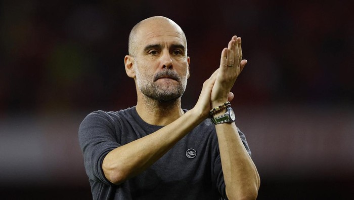 Soccer Football - Premier League - Arsenal v Manchester City - Emirates Stadium, London, Britain - October 8, 2023 Manchester City manager Pep Guardiola looks dejected after the match Action Images via Reuters/John Sibley NO USE WITH UNAUTHORIZED AUDIO, VIDEO, DATA, FIXTURE LISTS, CLUB/LEAGUE LOGOS OR LIVE SERVICES. ONLINE IN-MATCH USE LIMITED TO 45 IMAGES, NO VIDEO EMULATION. NO USE IN BETTING, GAMES OR SINGLE CLUB/LEAGUE/PLAYER PUBLICATIONS.