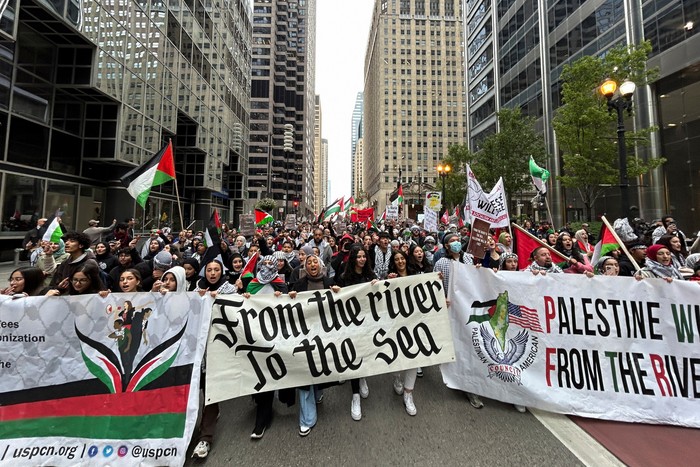 Palestinian-Americans and their supporters march as the conflict between Israel and the Palestinian militant group Hamas continues, in downtown Chicago, U.S., October 8, 2023. REUTERS/Eric Cox
