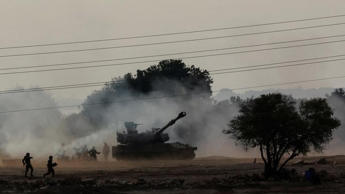 An Israeli tank is seen near Israels border with Lebanon, northern Israel, October 9, 2023. REUTERS/Ammar Awad