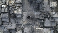 Serangan udara militer Israel mengakibatkan Masjid Yassin di Kota Gaza hancur. AP Photo/Hatem Moussa.