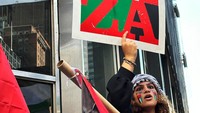 Mereka menggelar aksi untuk mendukung Palestina. 