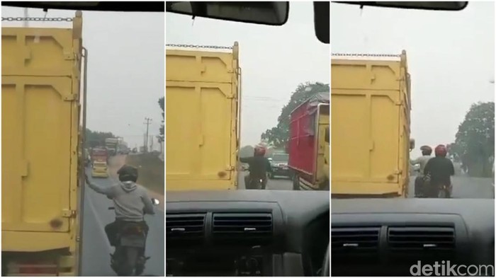 Pemotor tanpa pelat diduga memalak sopir truk yang melintas di Jalinsum Banyuasin.