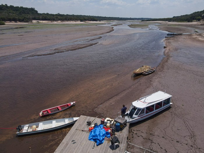 An aerial view shows Roberto Brito, a leader in the Tumbira community where he owns a guesthouse, which has been affected by the drought of Negro River, at a Rio Negro Sustainable Development Reserve, in Iranduba, Amazonas state Brazil, October 7, 2023. REUTERS/Bruno Kelly