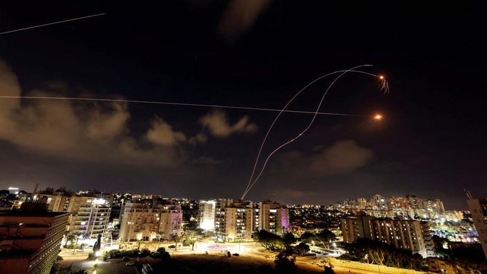 Aftermath of a scene where a rocket that was launched from the Gaza Strip into Israel landed in Ashkelon, southern Israel, October 11, 2023. REUTERS/Christophe Van Der Perre