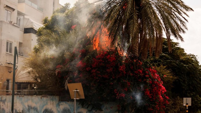 Aftermath of a scene where a rocket that was launched from the Gaza Strip into Israel landed in Ashkelon, southern Israel, October 11, 2023. REUTERS/Christophe Van Der Perre