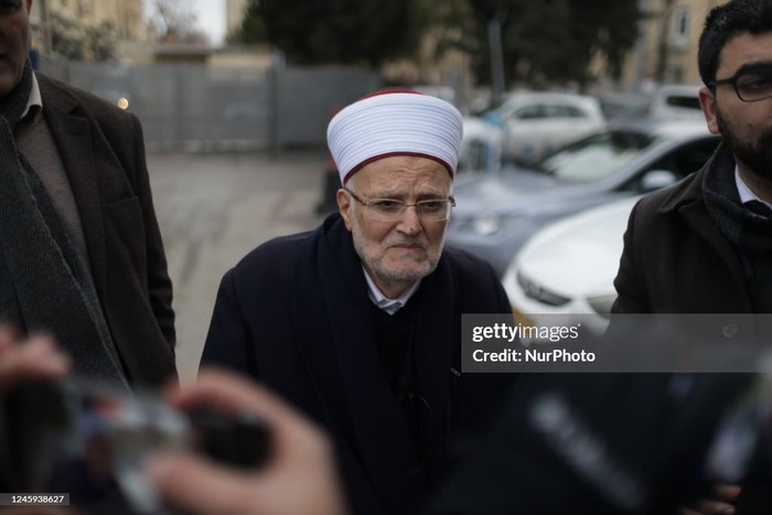 Sheikh Ekrima Said Sabri, the former grand mufti of Jerusalem and the Palestinian territories walks outside an Israeli police station after being summoned for interrogation, in Jerusalem on January 2, 2023. (Photo by Saeed Qaq/NurPhoto via Getty Images)