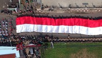 Kirab Merah Putih dilakukan di Jalan Raya Pondok Rajeg, Jalan KSR Dadi Kusmayadi sampai Komplek Pemda Bogor.  