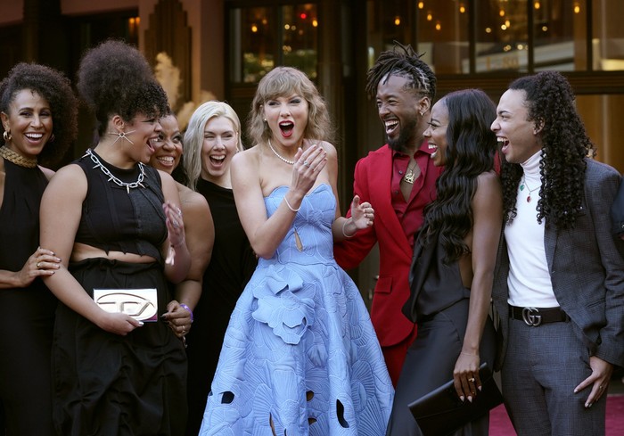 Taylor Swift arrives at the world premiere of the concert film 