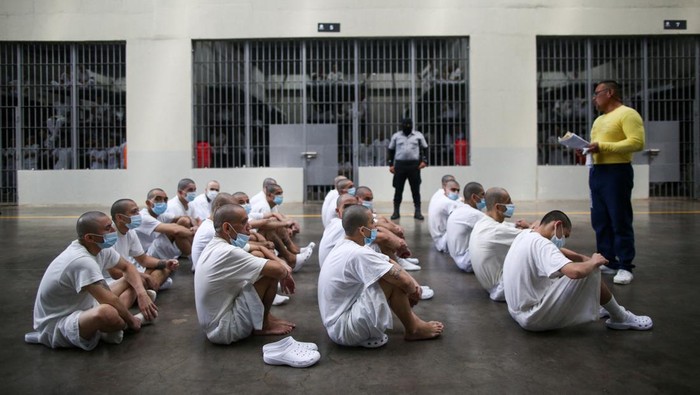 Inmates exercise, during a tour in the 