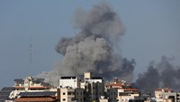 Gedung dan bangunan di Gaza hancur usai serangan udara militer Israel selama enam hari berturut-turut. Reuters/Saleh Salem.