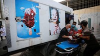 Ini penampakan truk es krim yang jadi kamar mayat sementara di Palestina, Minggu (15/10/2023).