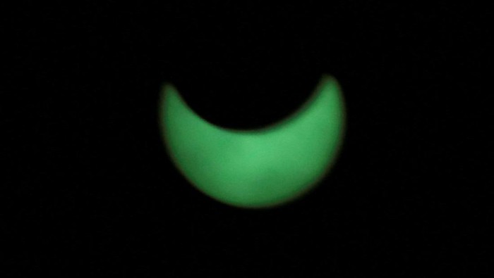 A combination picture shows a solar eclipse from Edzna archaeological site in Campeche state, Mexico October 14, 2023. REUTERS/Henry Romero